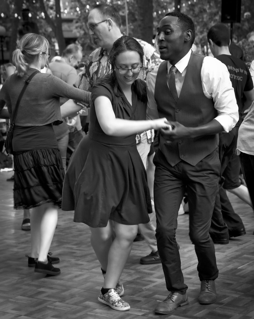 Couples swinging to big band music in Seattle parks